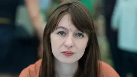 Sally Rooney declares she cannot travel to the UK over potential arrest